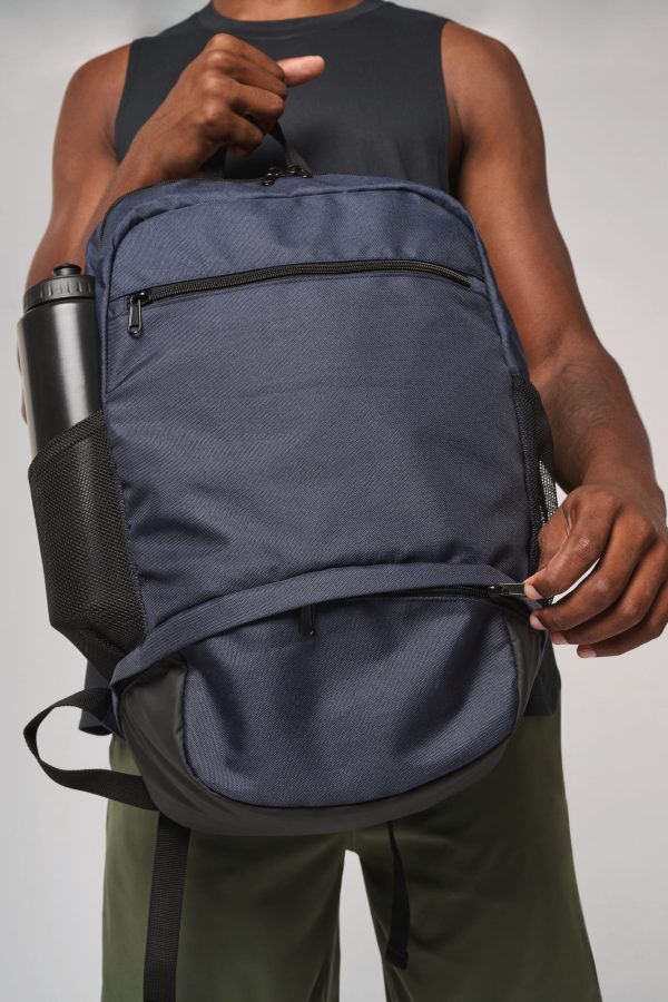 Mochila com compartimento para bola